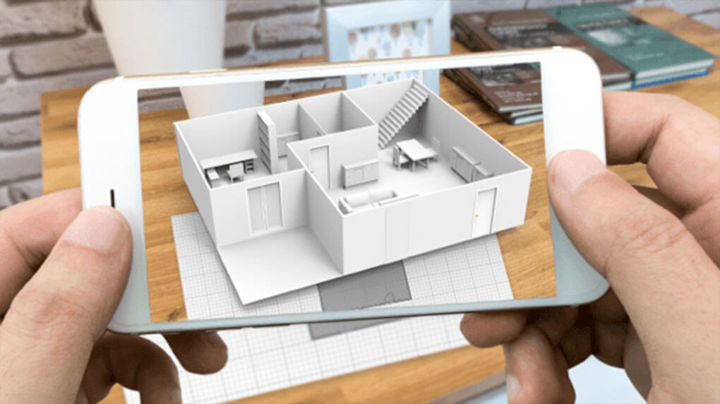 iPhone showing 3D house plan through augmented reality