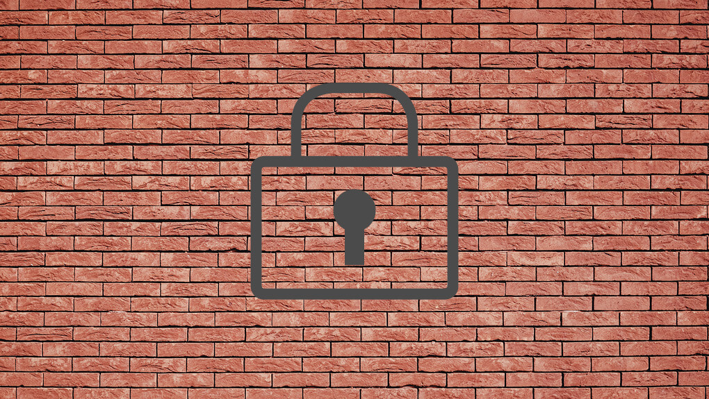 brick wall with a lock icon on it