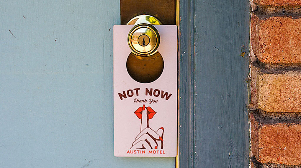 do not disturb hotel door sign