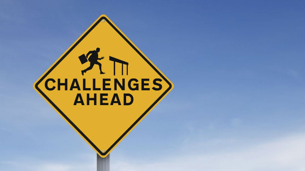 challenges ahead sign 