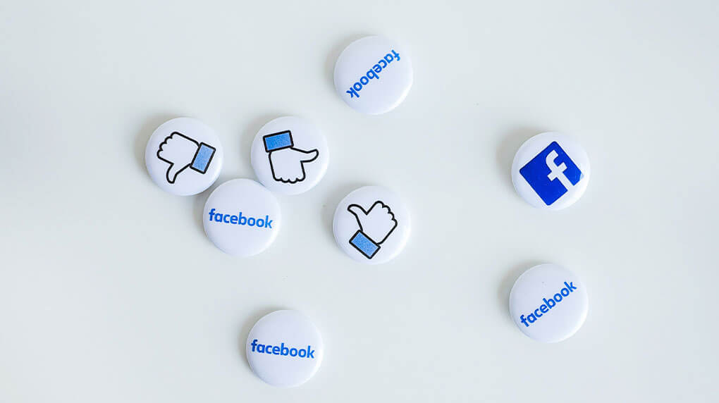Facebook logos on lapel pins